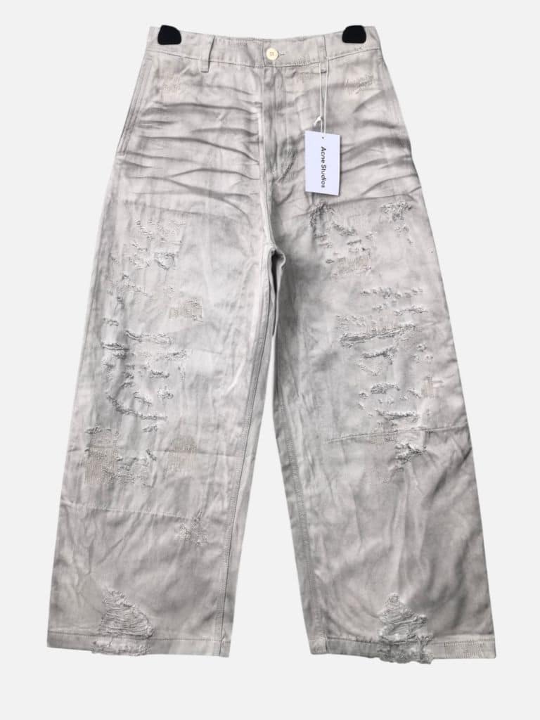 Acne Studios "Mended" Distressed Denim Trousers Acne Studios Mended Distressed Denim Jeans | Fragment Clothing